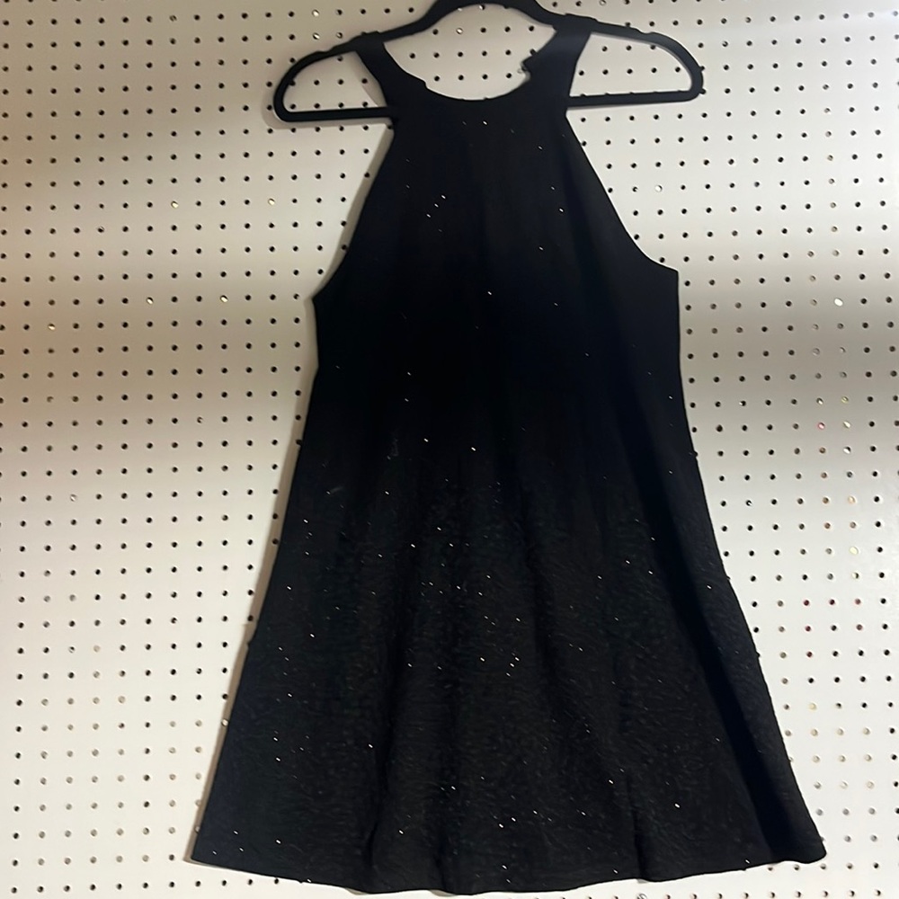 your mini sparkly dress or as a top